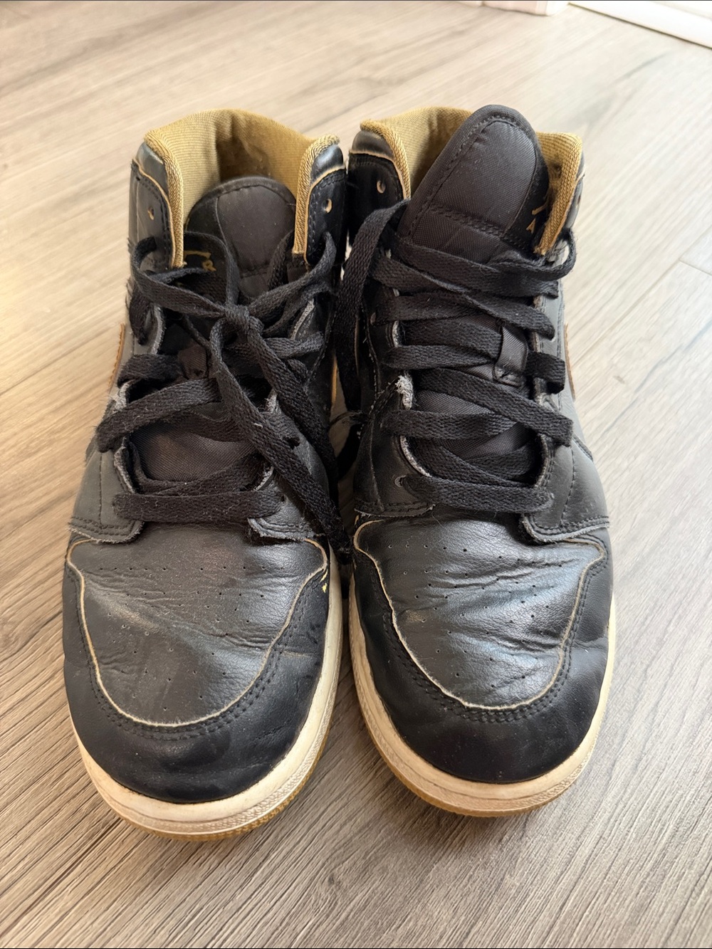 Nike Air Jordan Black High-Top Sneakers with Tan Lining